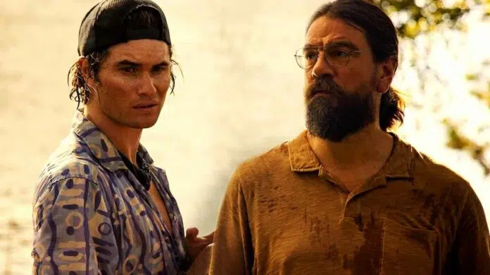 Charles Halford as Big John and Chase Stokes as John B Routledge In Netflix Outer Banks Series